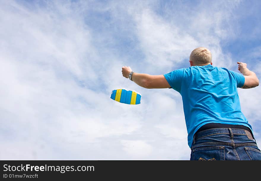 A man is trying to kite. A man is trying to kite.