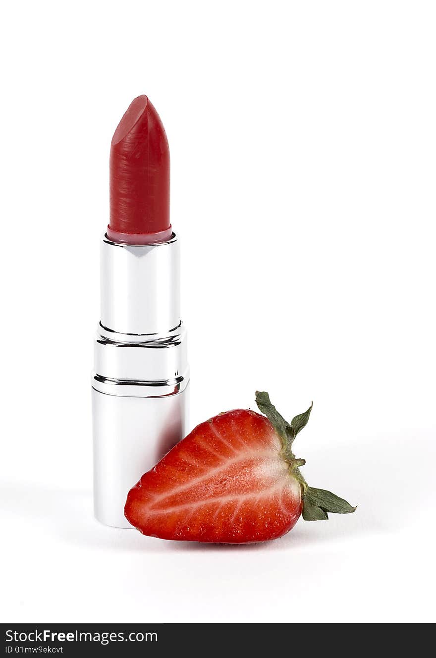 Lipstick strawberry flavored on a white background