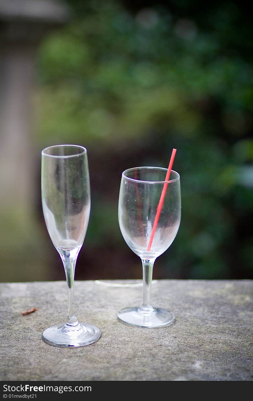 Two empty glasses - wine and champagne