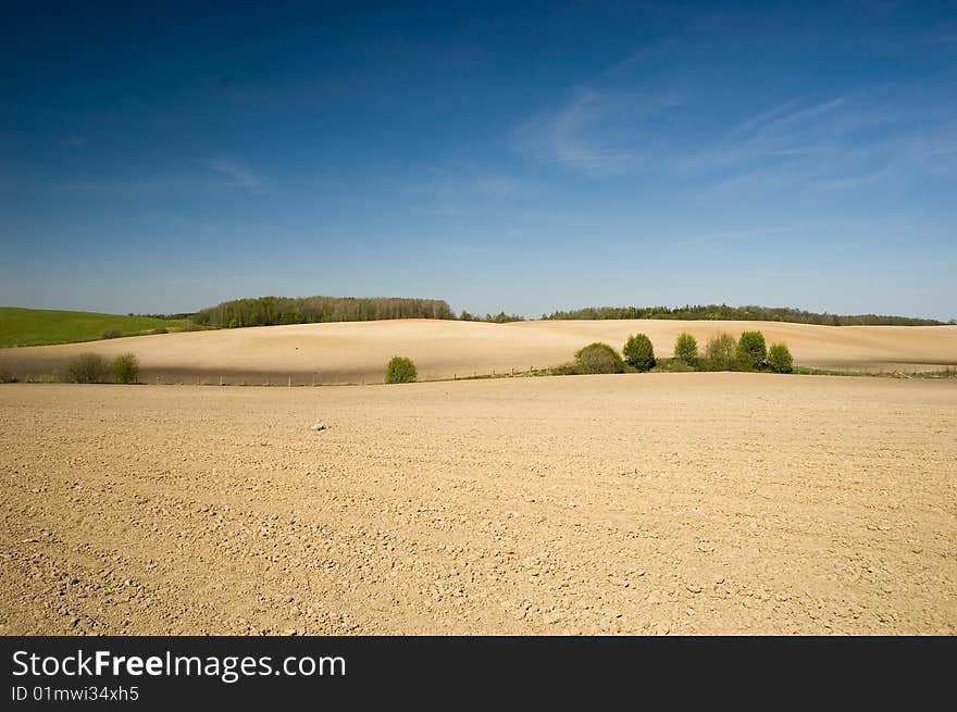 Agricultural fields with deep blue sky. Agricultural fields with deep blue sky