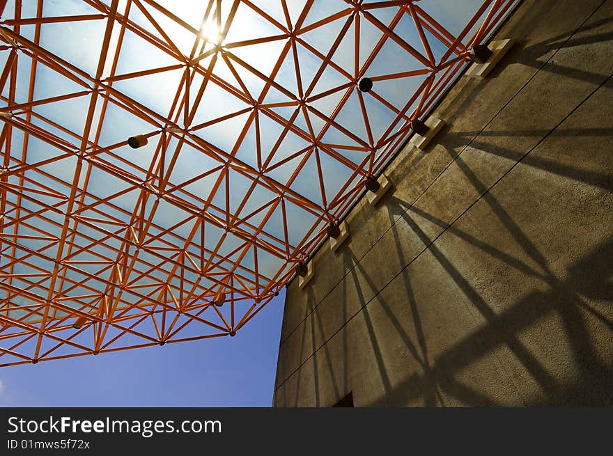Glass roof supported by steel truss. Glass roof supported by steel truss
