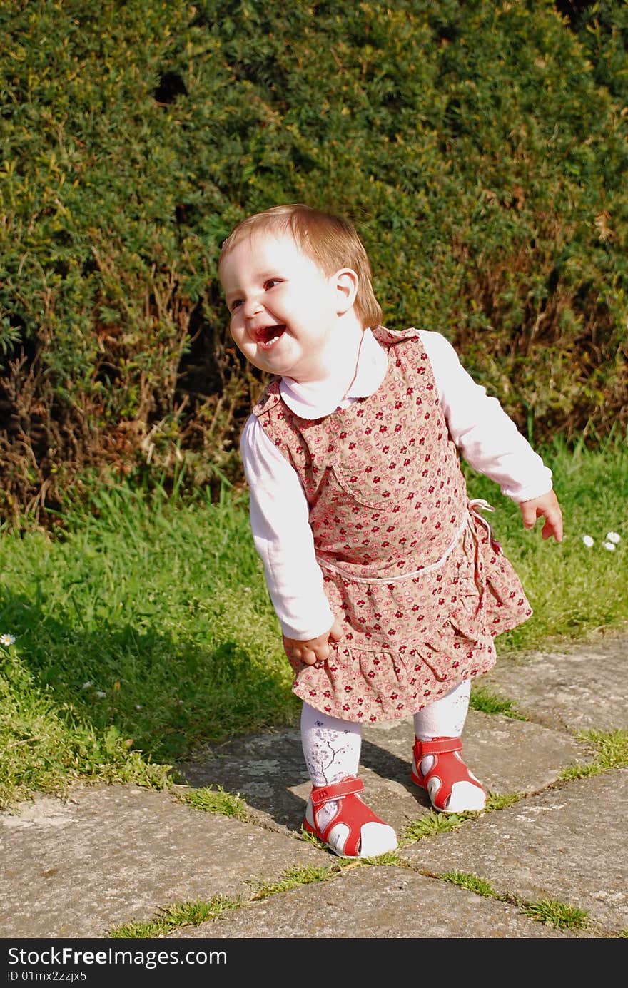 Happy little girl in the park