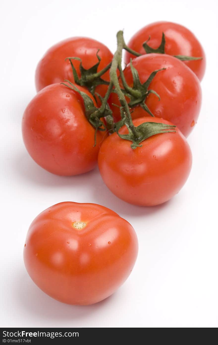 Group red tomato isolated on white background.