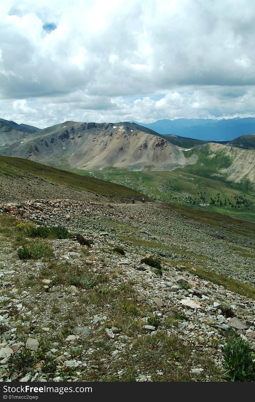 Two dirt bikes in the distance headed toward Leadville. Two dirt bikes in the distance headed toward Leadville