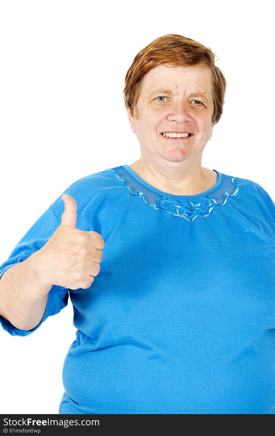 Elderly woman is putting her thumb up isolated on white. Elderly woman is putting her thumb up isolated on white