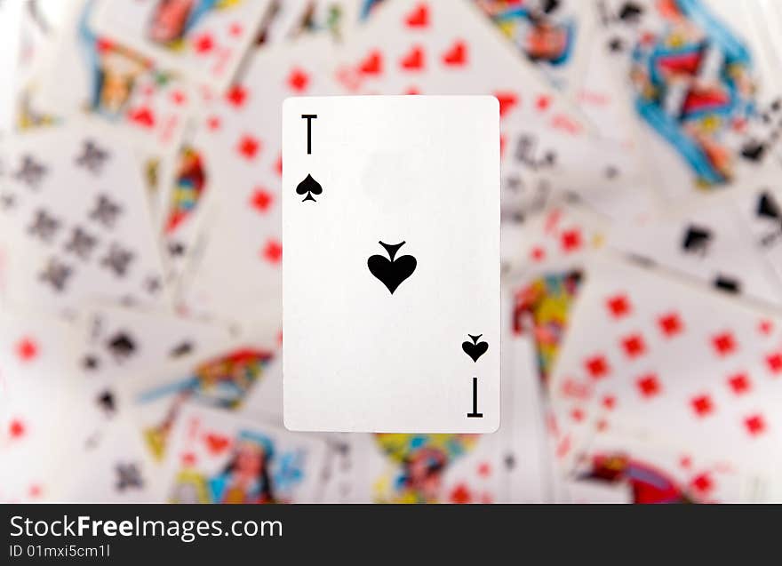 Close-up up of an ace over blurred card background