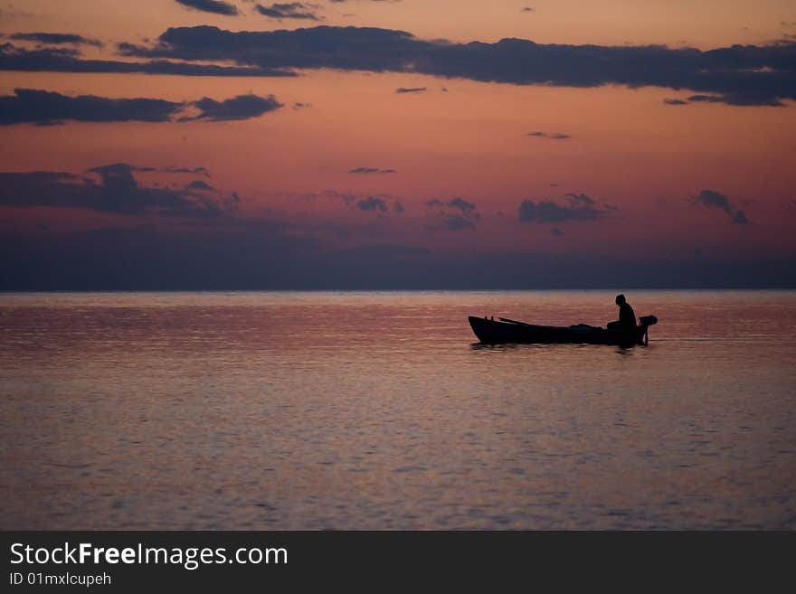 Fishing boat in a sunset light