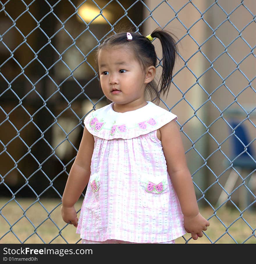 A happy little Chinese girl. A happy little Chinese girl