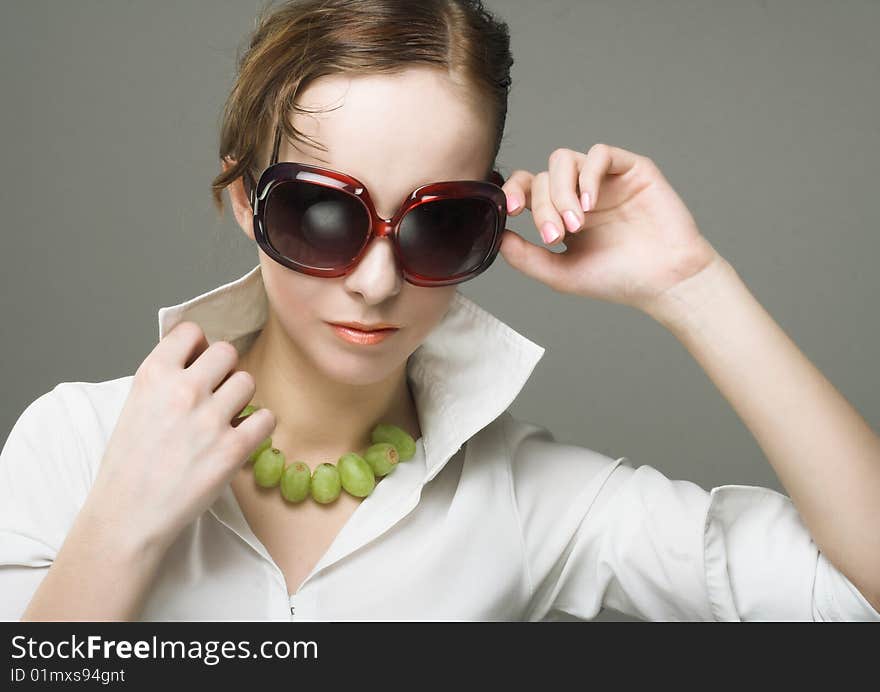 Portrait of young woman with sun-glasses. Portrait of young woman with sun-glasses