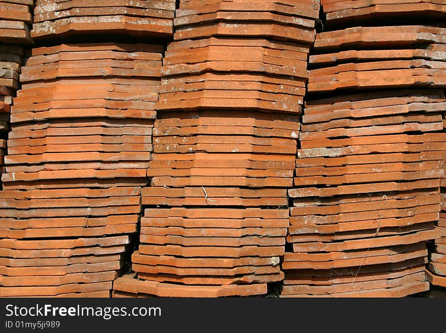 Stock photo of old red tiles put one on another. Stock photo of old red tiles put one on another