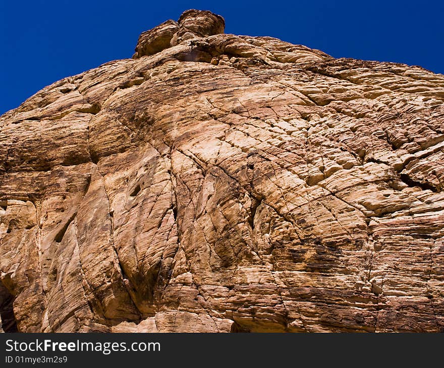 View of red rocks from a low angle. View of red rocks from a low angle.