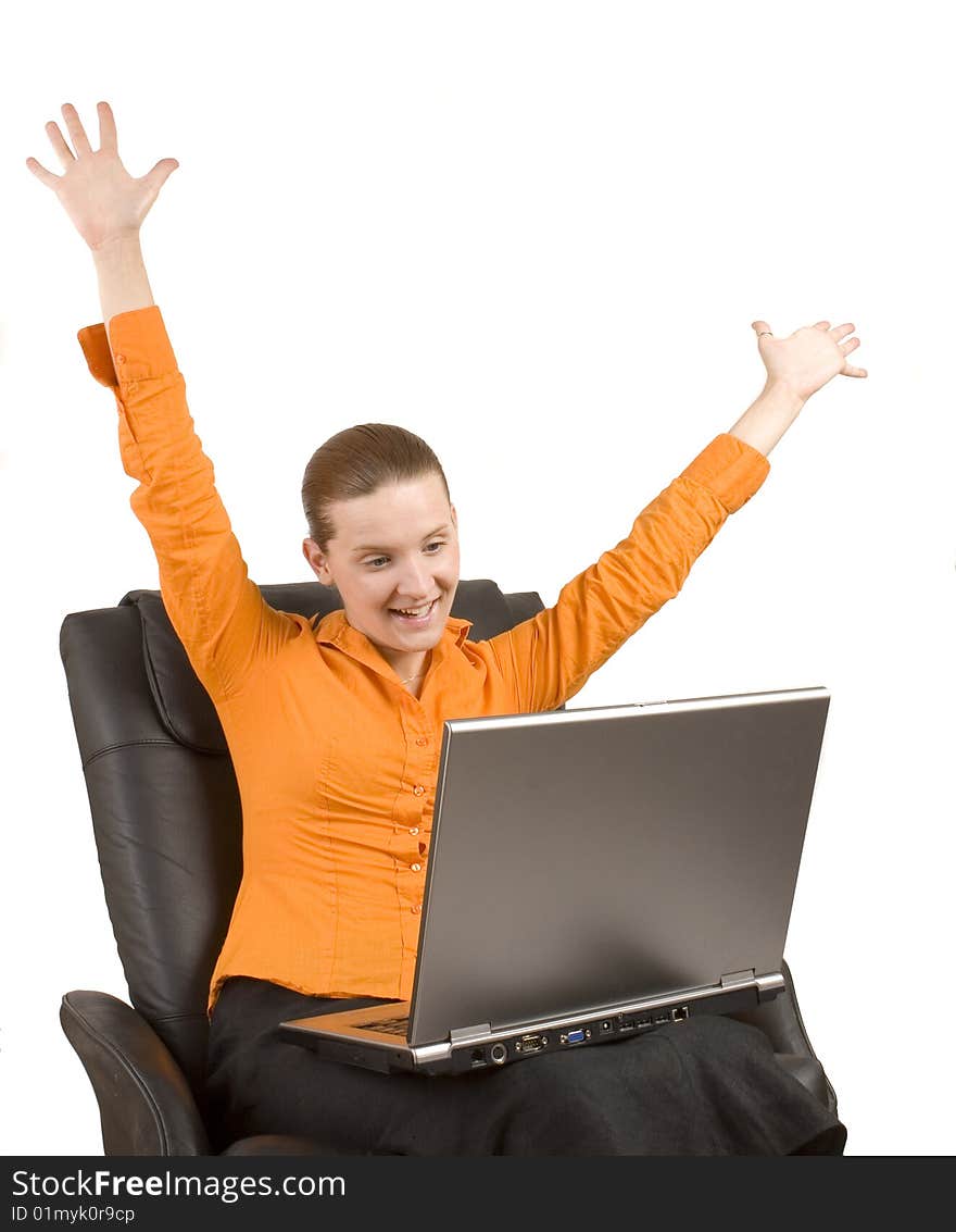 Young woman is happy at laptop. isolated