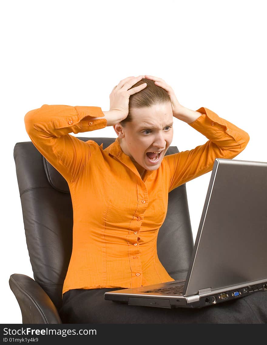 Young woman screaming at laptop isolated