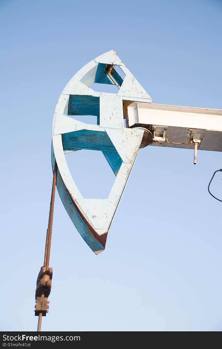 Oil pump on a background blue sky