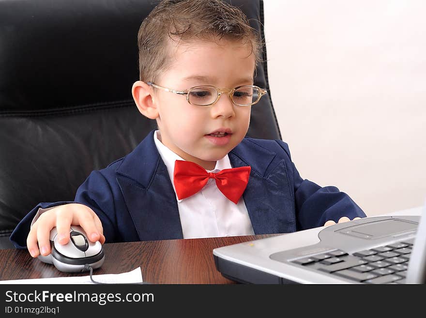 white small businessman looking for his market crises and studying at notebook. white small businessman looking for his market crises and studying at notebook