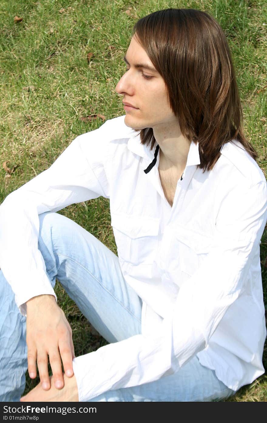 Young man resting outdoor in a park