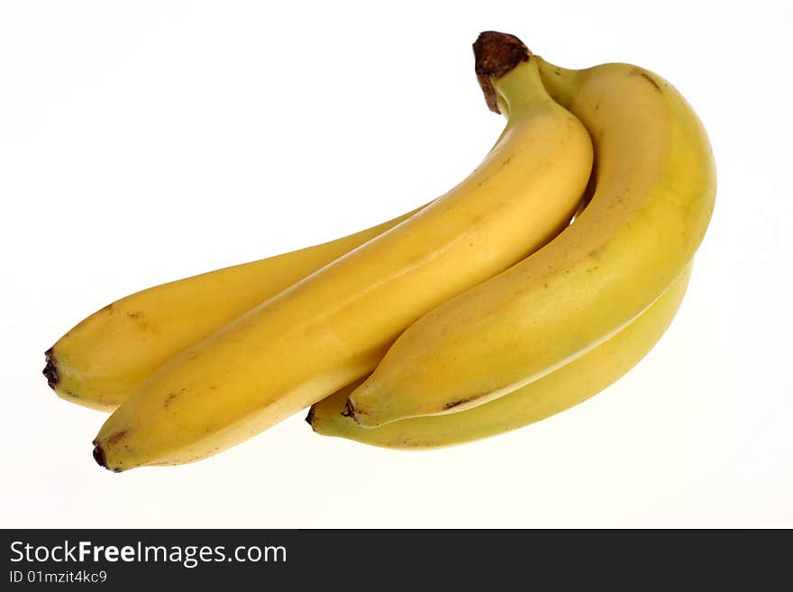 Four bananas on white background