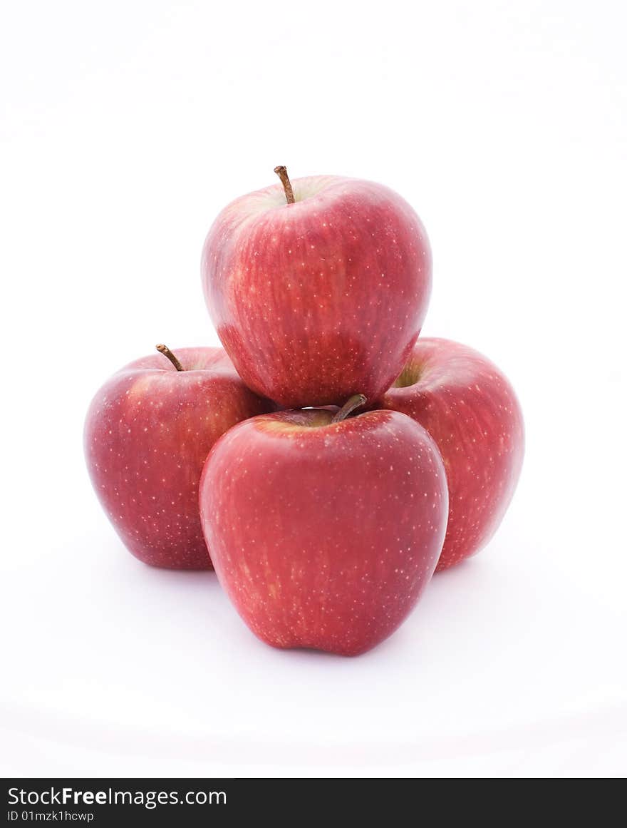 Red apples on a white background