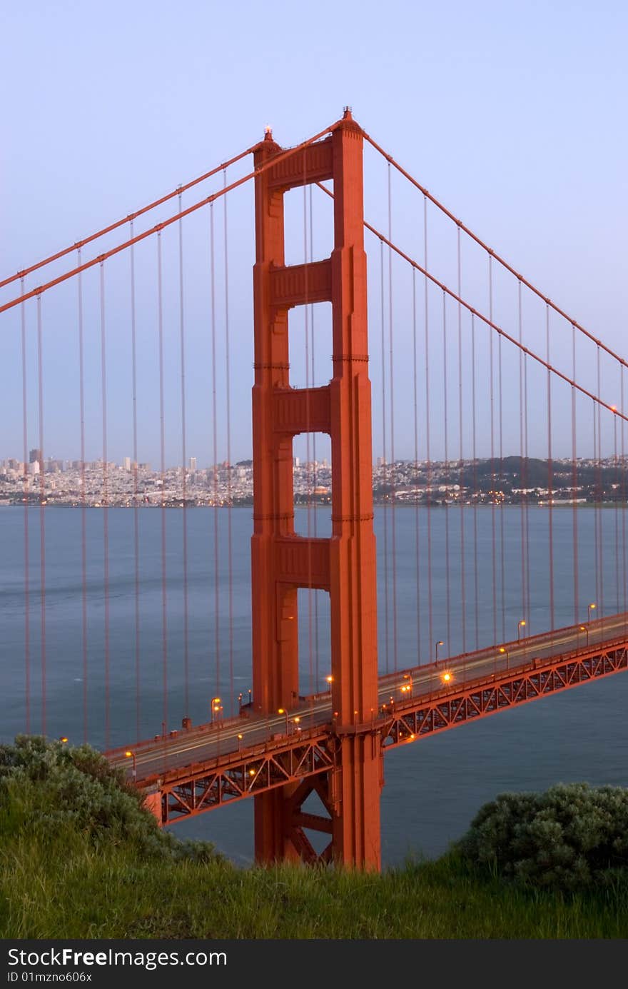 The Golden Gate bridge is shown here during sundown, from the vantage point of Marin Headlands in San Francisco, California.