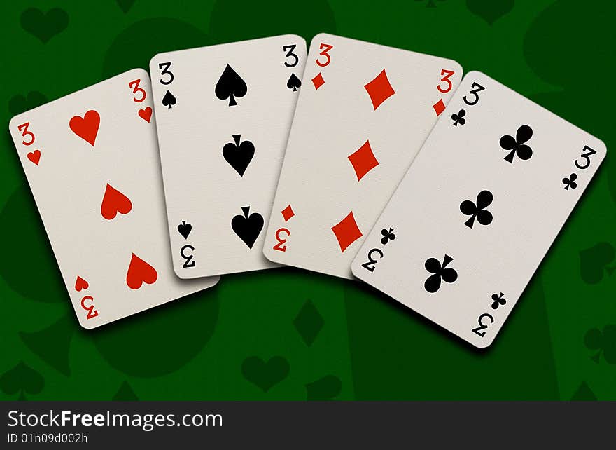 Playing cards on green background