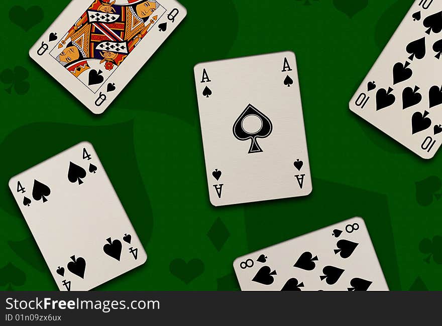 Playing cards on green background. Playing cards on green background