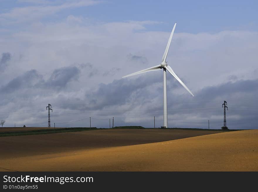 Wind turbine in field