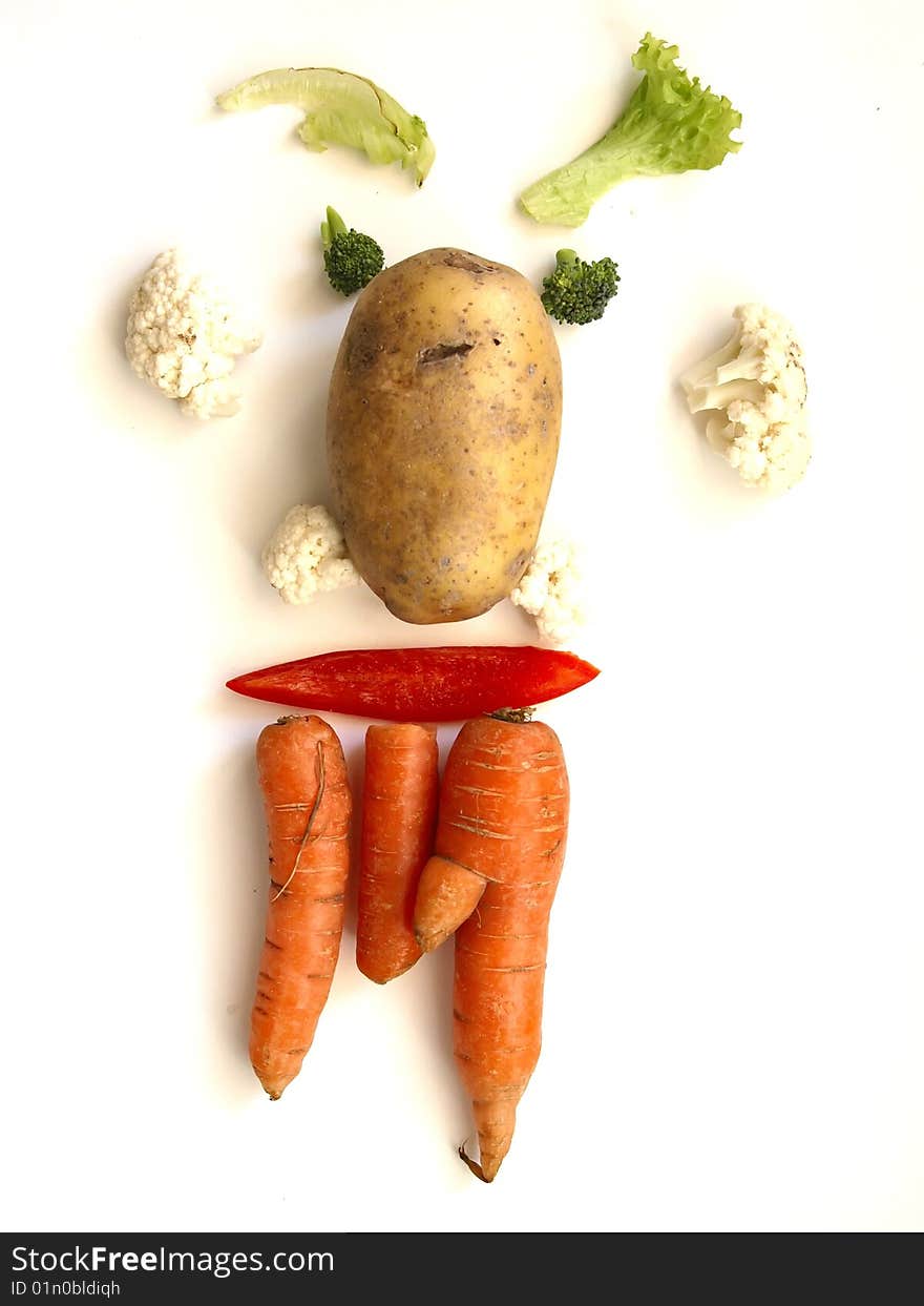 A vegetable face with different vegetables. A vegetable face with different vegetables