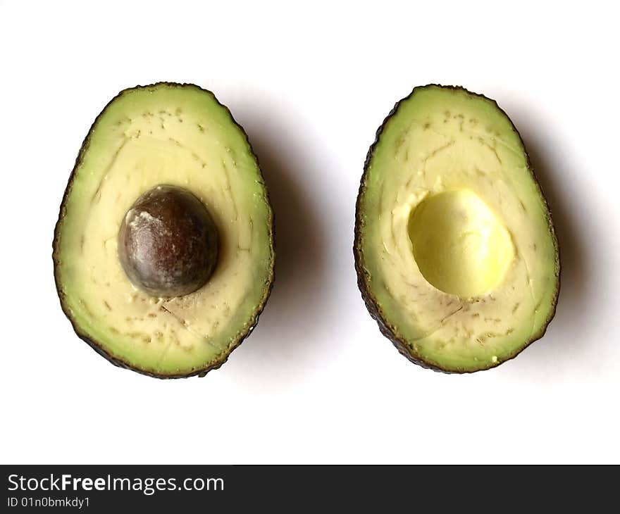 An open avocado fruit, white background