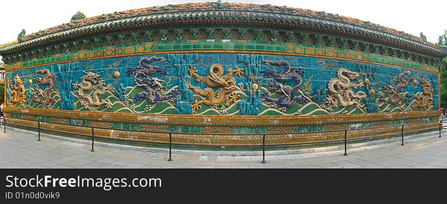 The Nne Dragons Wall in Bei Hai Park in Beijing, China. The Nne Dragons Wall in Bei Hai Park in Beijing, China