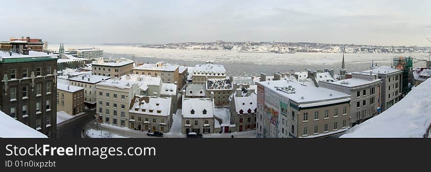 A panorama of Quebec City and the St. Lawrence River in winter