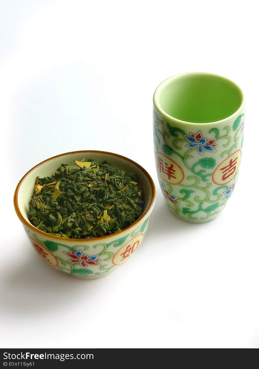 Set of ware for green tea from two subjects isolated on a white background