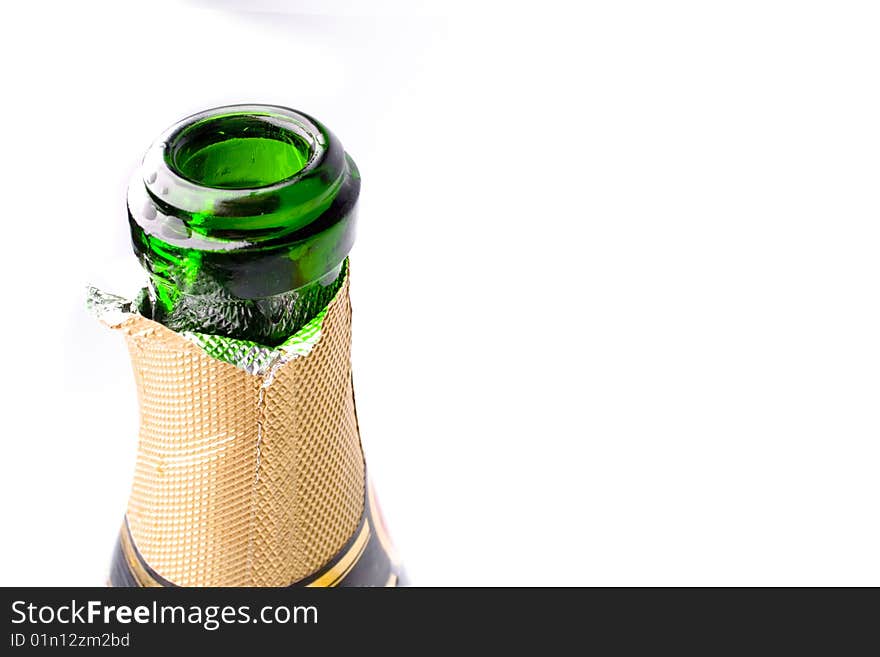 Champagne bottle closeup on white background