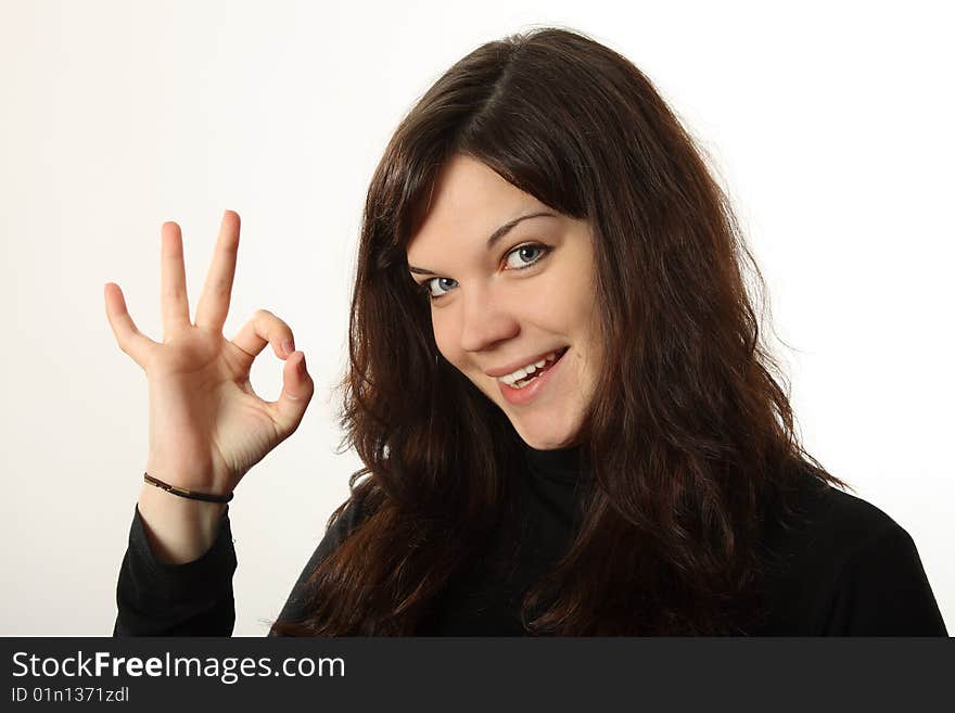 The beautiful, emotional girl on a white background