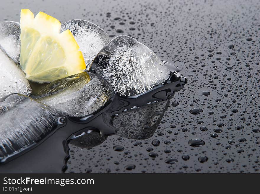 Lemon slice and the broken ice. Lemon slice and the broken ice