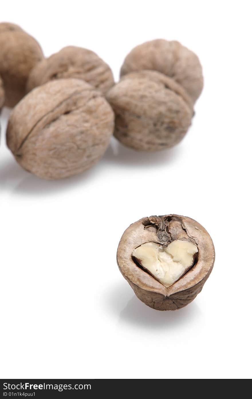 The isolated walnut on white in the form of heart