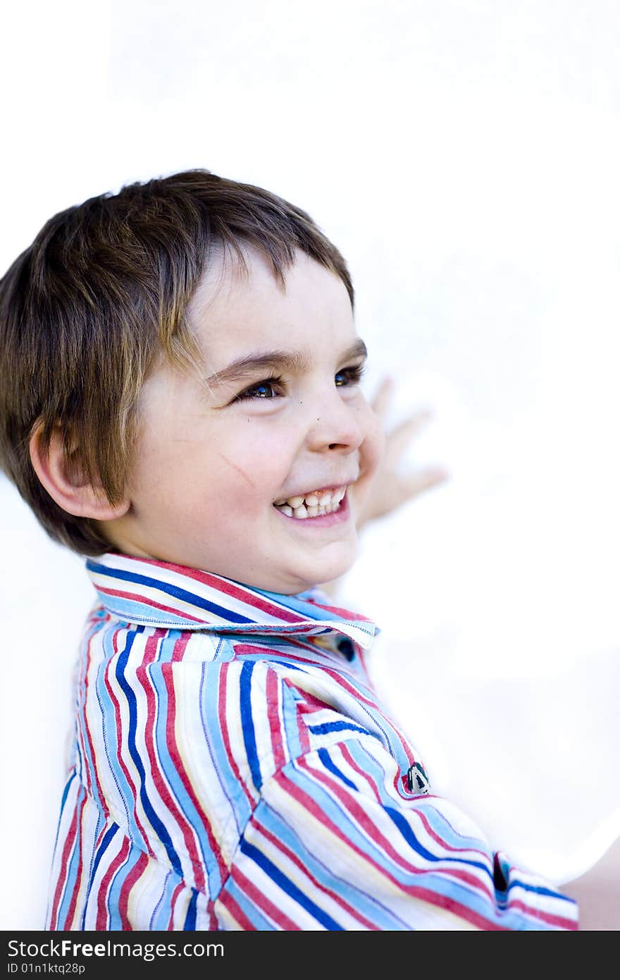 Happy child with a huge genuine smile on his face. Happy child with a huge genuine smile on his face.