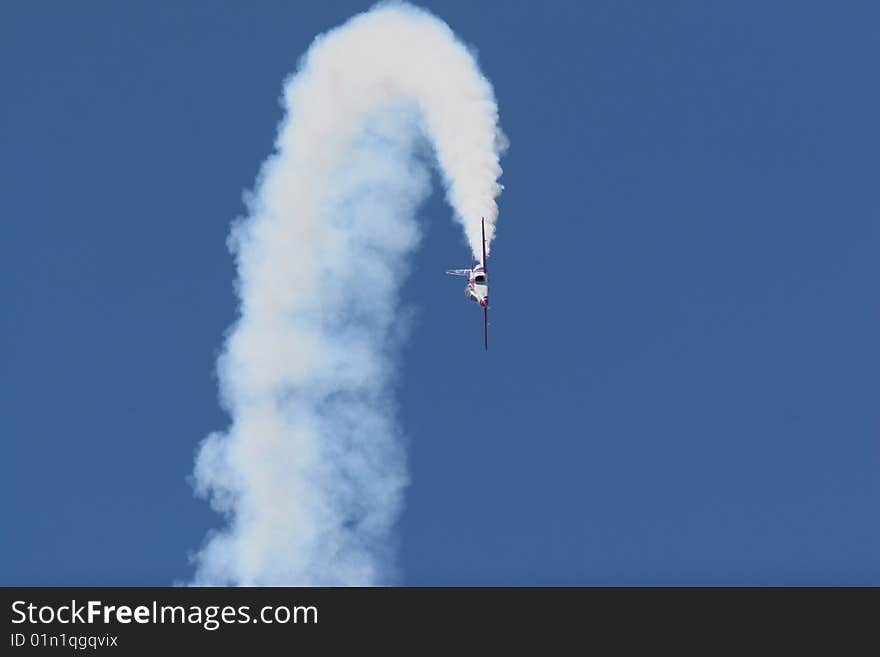 Aerobatic aircraft making looping in the air