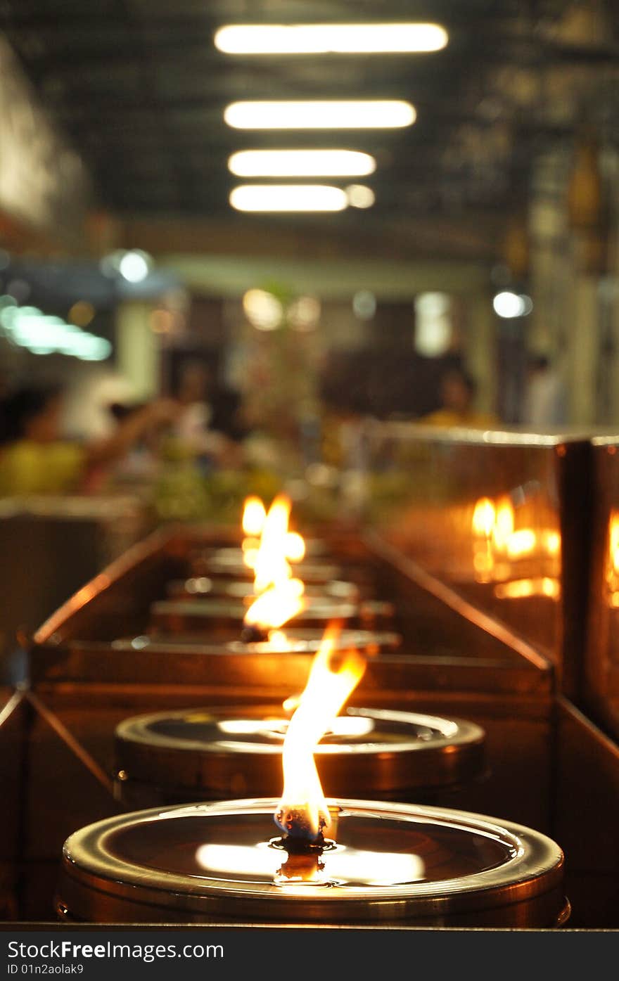 Oil lamp in a temple in Thailand. The lamp on the importance of religion One is faith. Oil lamp in a temple in Thailand. The lamp on the importance of religion One is faith.