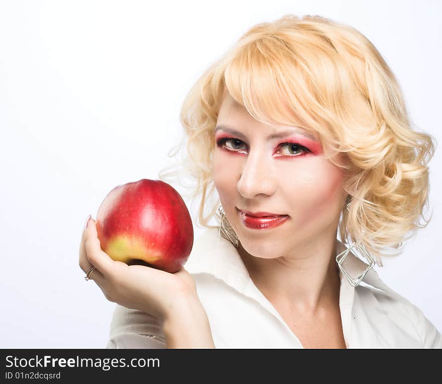 Portrait Of Young Woman With Red Apple