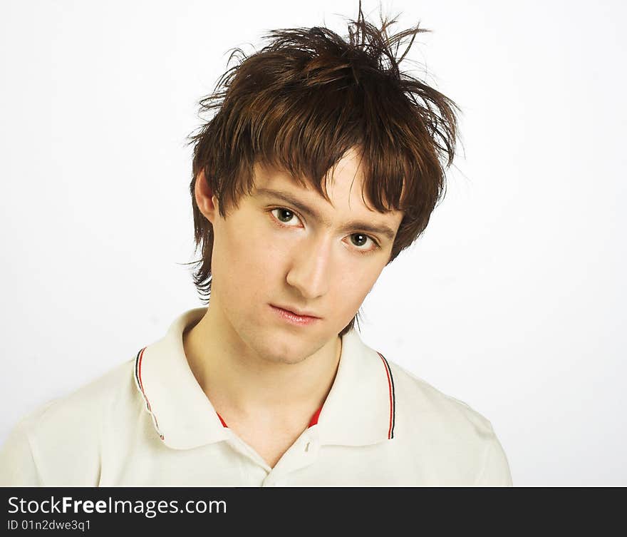 Portrait of young man in white shirt. Portrait of young man in white shirt