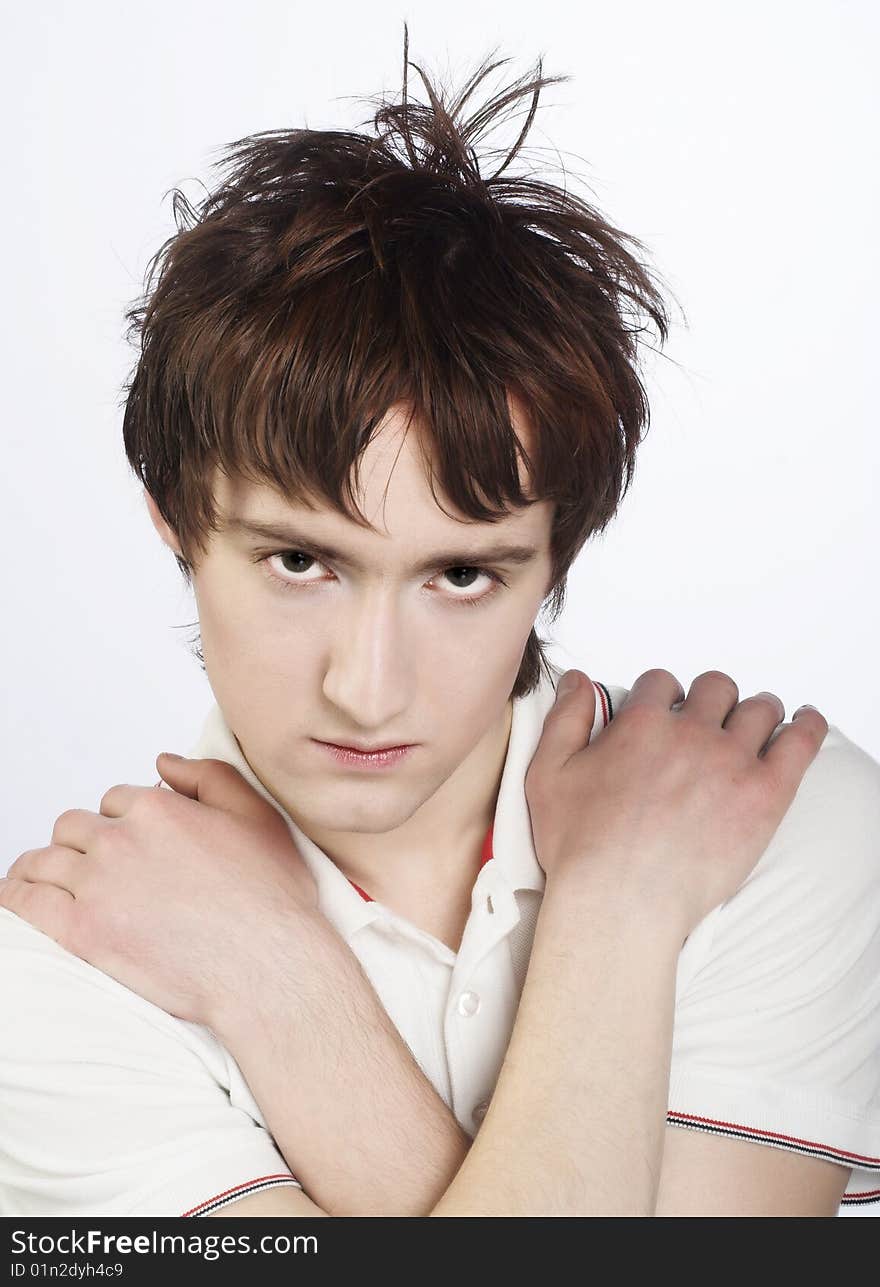 Portrait of young man in white shirt. Portrait of young man in white shirt