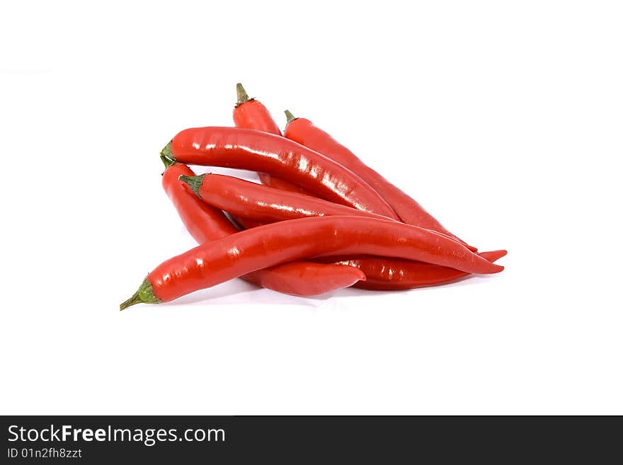 Red peppers of the white background