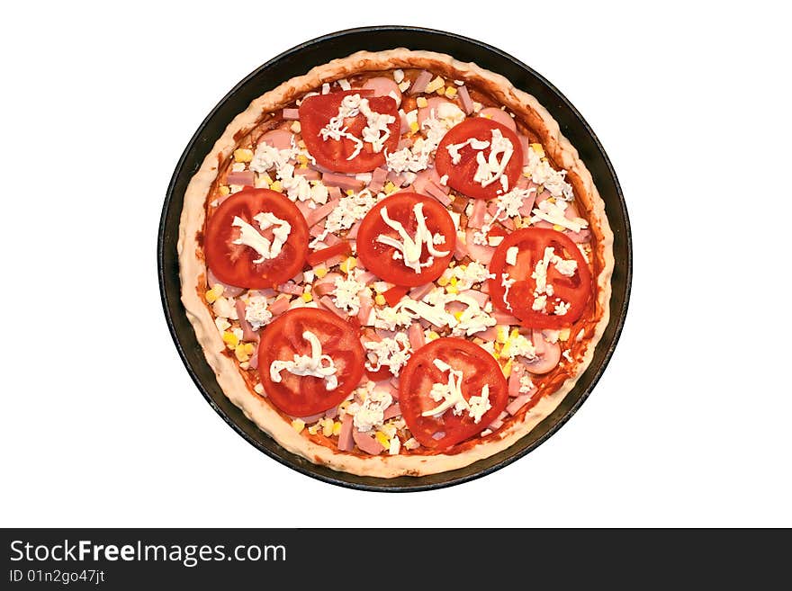 Not cooked pizza on the white background