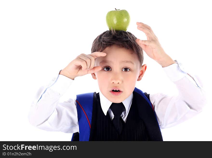 Schoolboy with backpack and apple