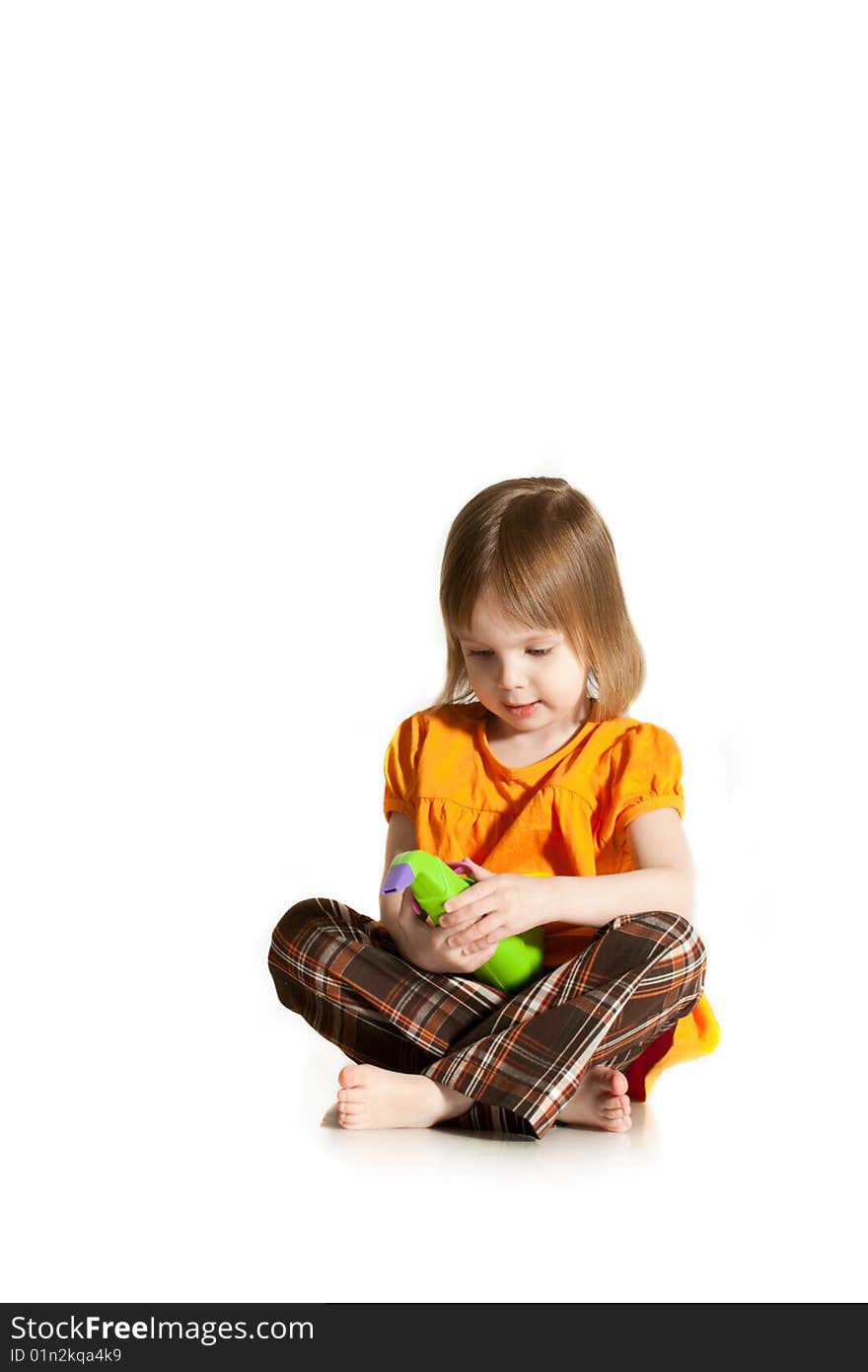 Girl with toy saxophone.