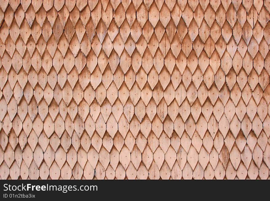 A stock photo of an old roof of a house made of wooden tiles. A stock photo of an old roof of a house made of wooden tiles