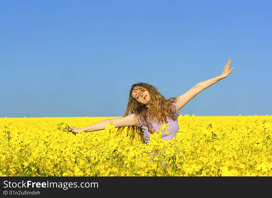 Woman in rape(canola) field. Woman in rape(canola) field