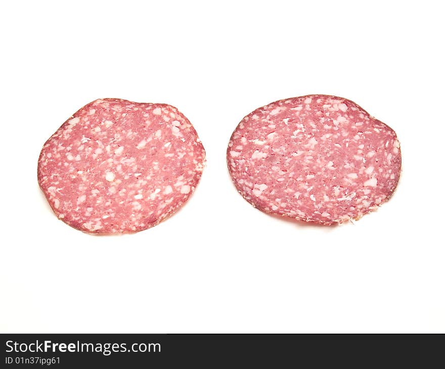 Slices of salami 
photography studio with white background