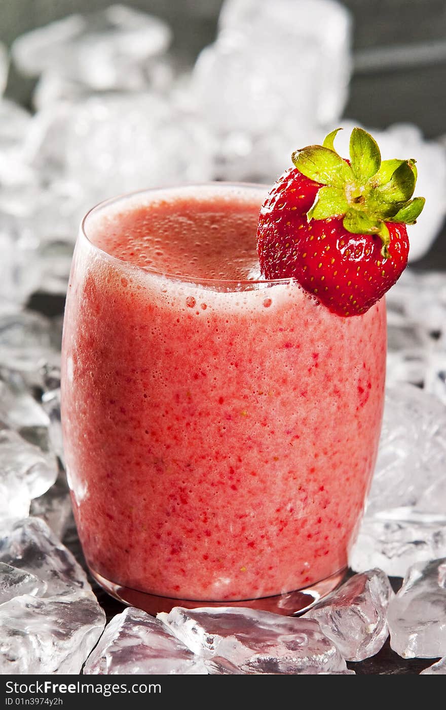 Glass of freshly made strawberry smoothie. Glass of freshly made strawberry smoothie