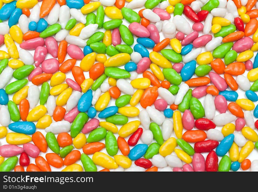 Disposit of the sweetmeats in colour glaze on white background